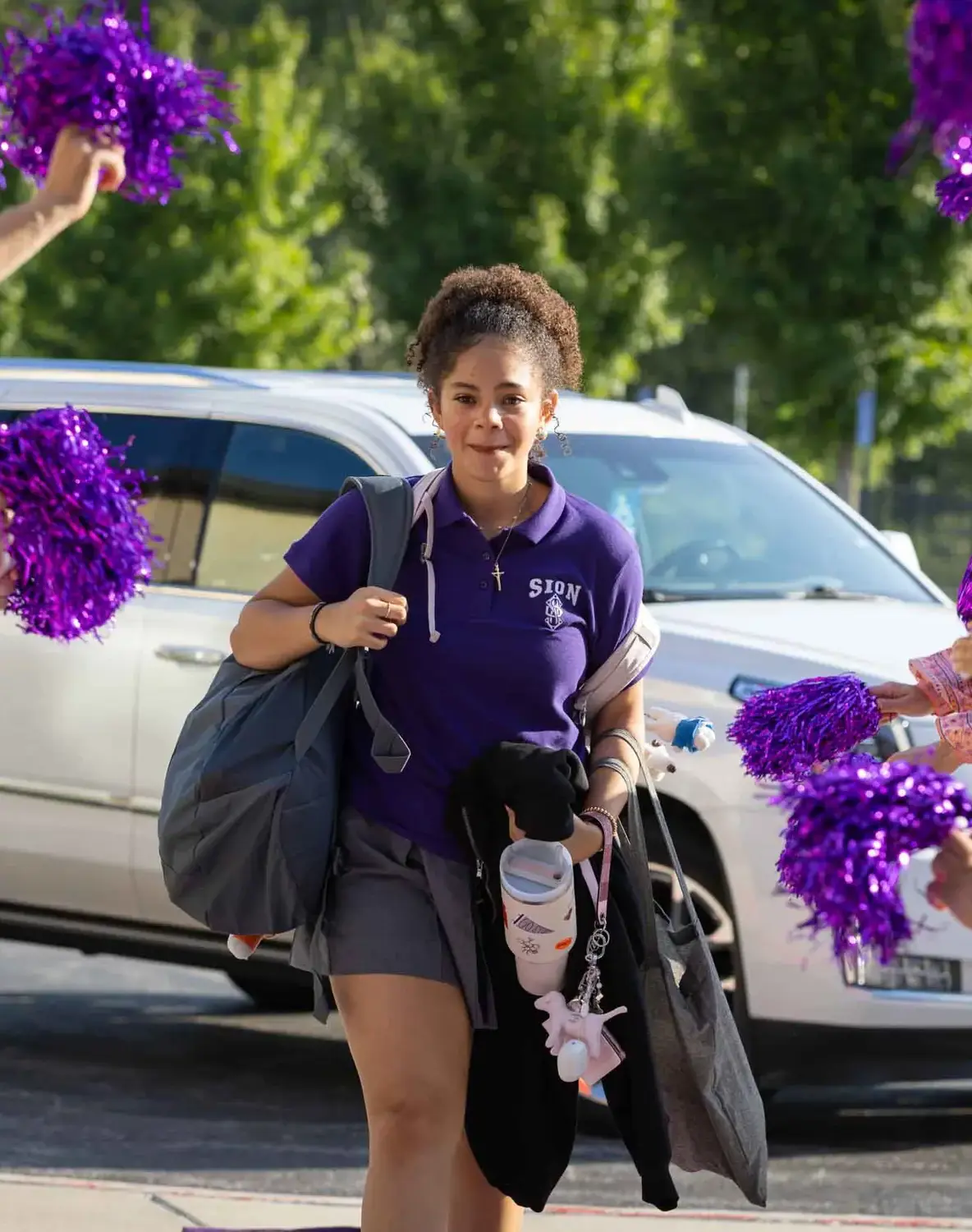 Notre Dame de Sion High School student walking into school.