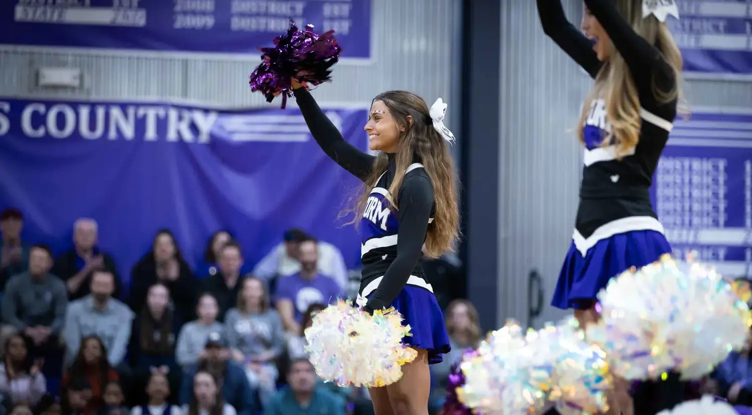 Notre Dame de Sion High School cheer team performing.