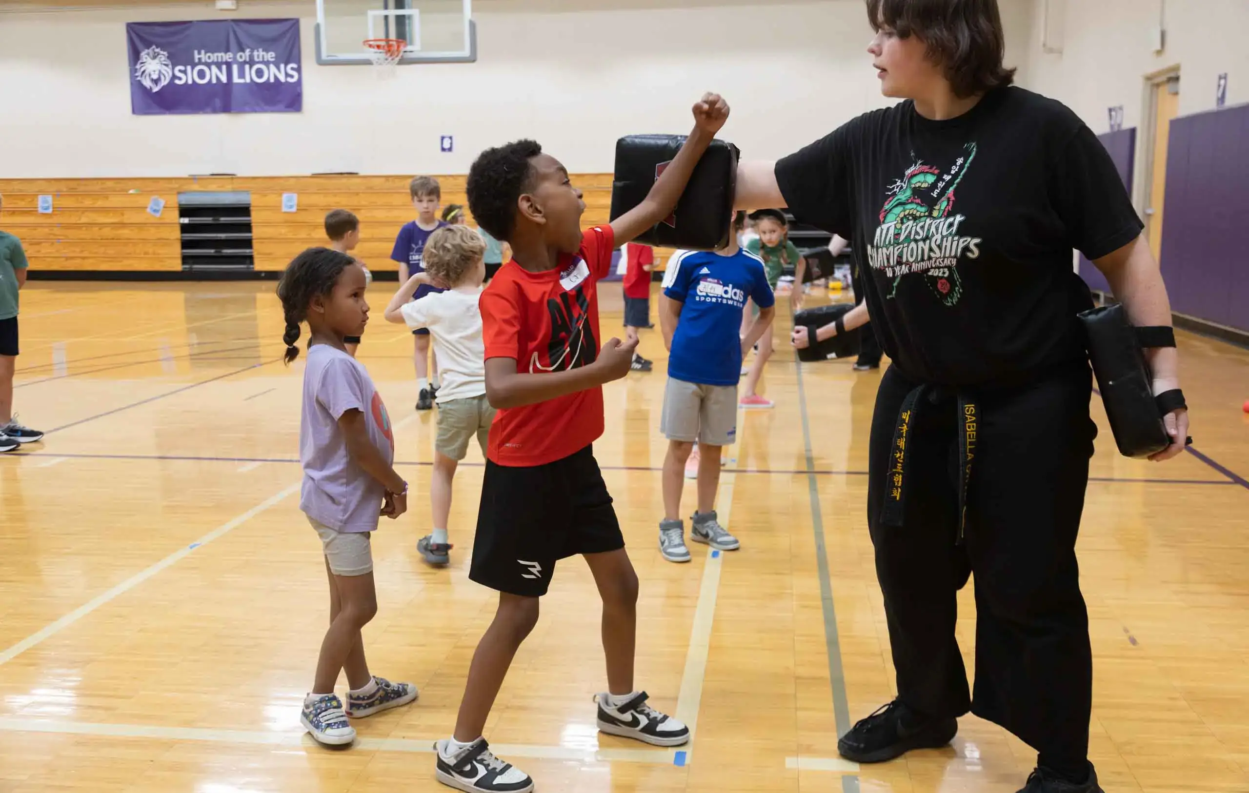 Notre Dame de Sion student taking part in a martial arts lesson.