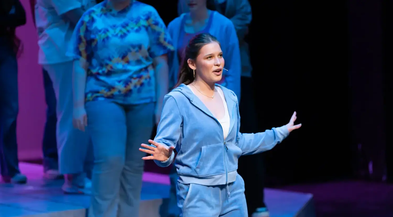 Notre Dame de Sion High School students performing in a school musical.
