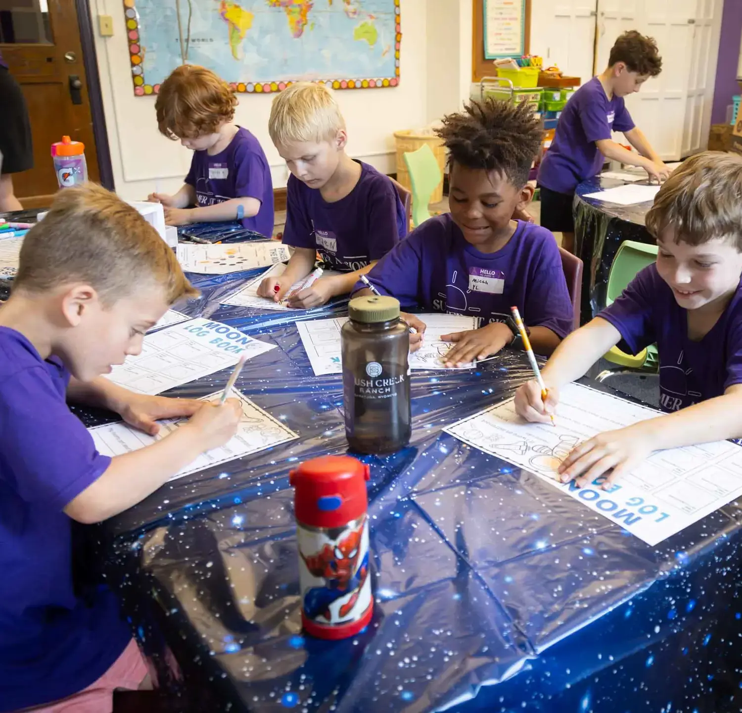 Notre Dame de Sion Camp Roar attendees learning about space.