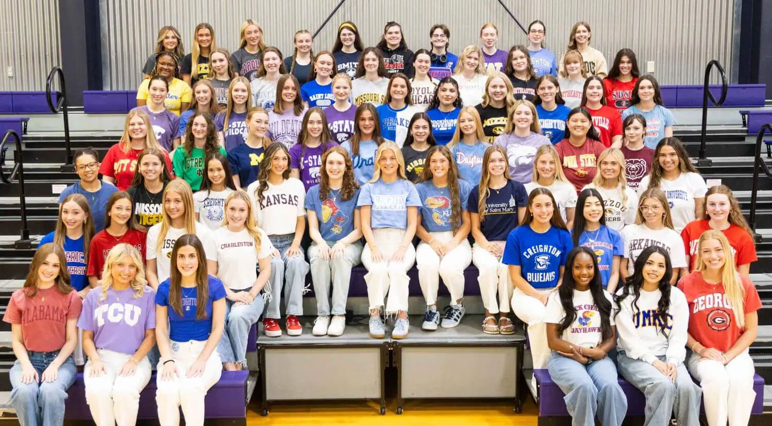 Notre Dame de Sion High School students wearing College shirts