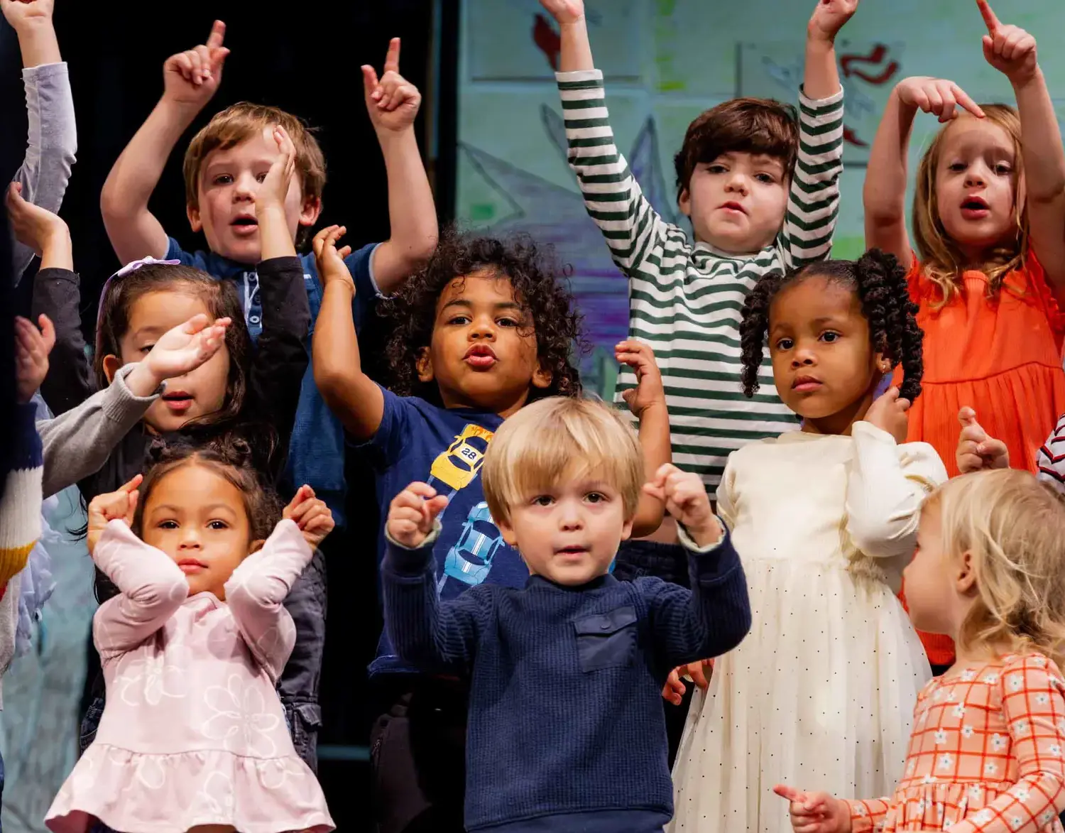 Notre Dame de Sion Grade School students singing in a school performance.